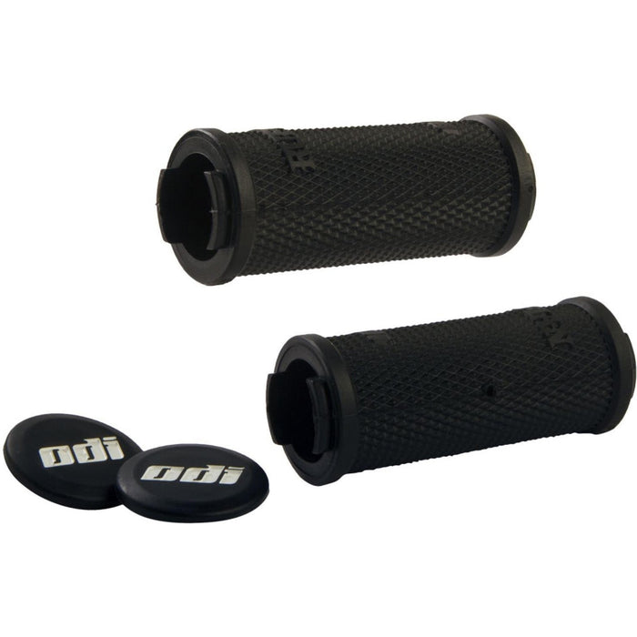 Black ODI MTB grips with diamondized texture and lock-on clamps for mountain bikes