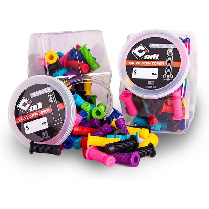 Colorful ODI Valve Stem Jars in plastic containers for tire valve protection and customization