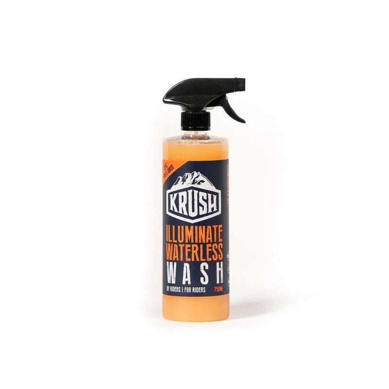 KRUSH ILLUMINATE WATERLESS WASH spray bottle with orange liquid for bikes and riders