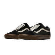 Pair of black and brown VANS SKOOL HEAVY CANVAS sneakers with white laces and iconic white Sidestripe on side