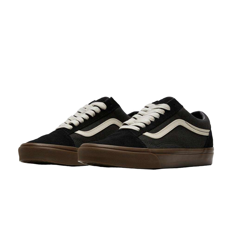 Pair of black and brown VANS SKOOL HEAVY CANVAS sneakers with white laces and iconic white Sidestripe on side