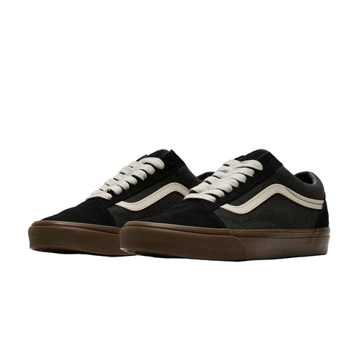 Pair of black and brown VANS SKOOL HEAVY CANVAS sneakers with white laces and iconic white Sidestripe on side