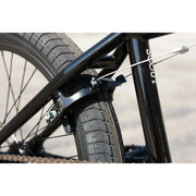 Close-up of Sunday Scout 20" BMX bike rear wheel with Odyssey Springfield U-brake and Odyssey Path Pro tire.