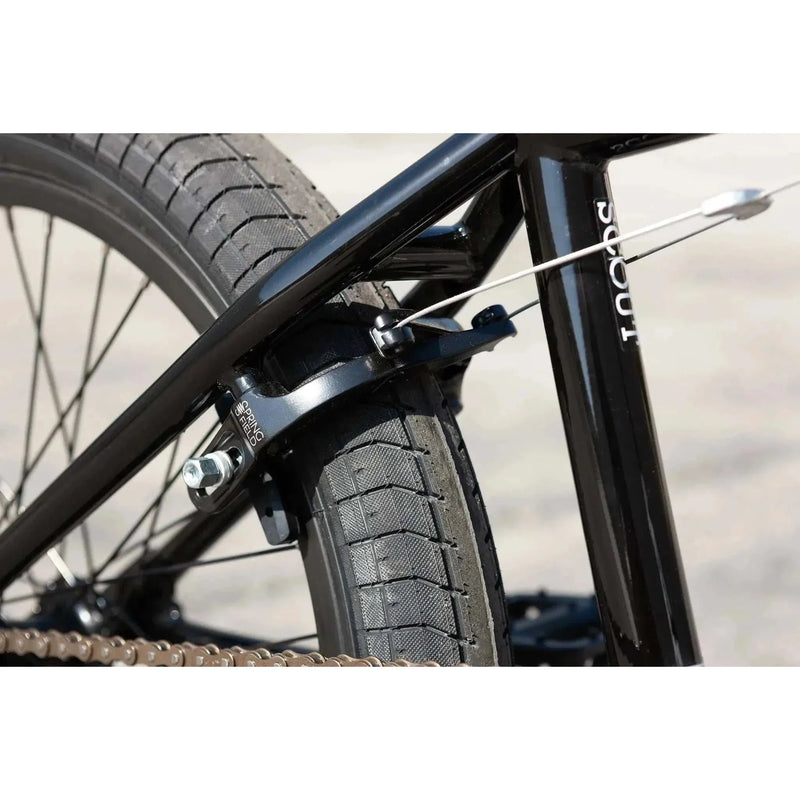 Close-up of Sunday Scout 20" BMX bike rear wheel with Odyssey Springfield U-brake and Odyssey Path Pro tire.