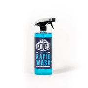 Bottle of KRUSH RAPID WASH foaming bike cleaner with blue liquid and spray nozzle