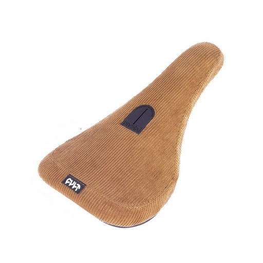 CULT corduroy bike seat in tan brown with textured fabric and branded logo patches