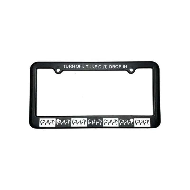 CULT Drop In License Plate Frame in black with "TURN OFF TUNE OUT DROP IN" text and drop-in design for easy installation