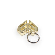 ÉCLAT SPOKE KEY CHAIN in gold, made from heat-treated chromoly, durable for 3.5mm spoke nipples.