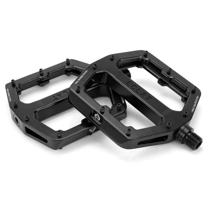 Black ÉCLAT SURGE XL Pedal pair with oversized platform and replaceable pins for BMX bikes