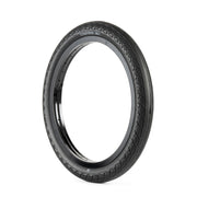 Éclat Vapour Tire with aggressive tread and durable sidewall protection.