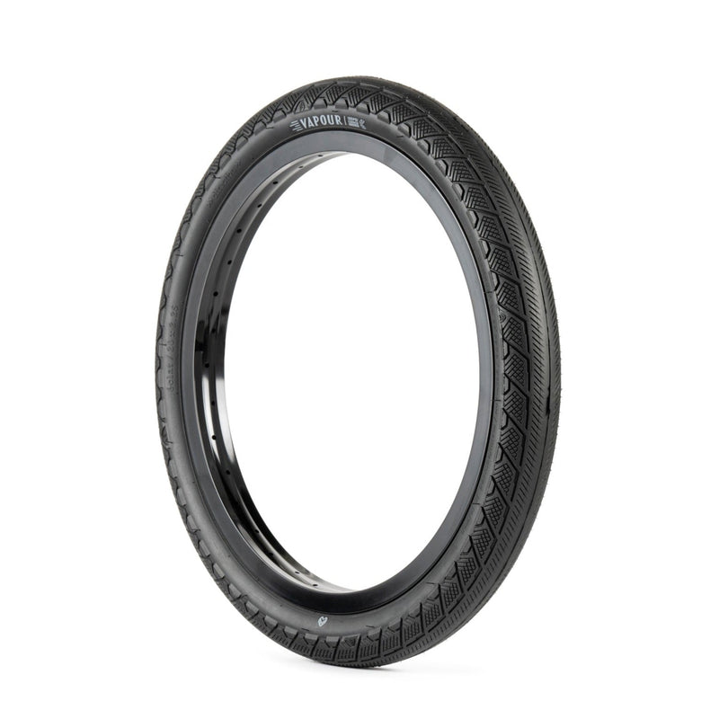 Éclat Vapour Tire with aggressive tread and durable sidewall protection.
