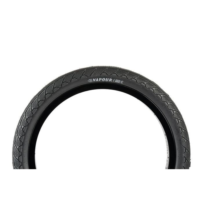 ÉCLAT VAPOUR TIRE with textured tread, black, 2.4" size shown.