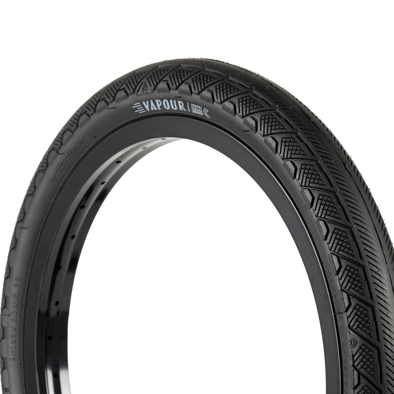 ÉCLAT VAPOUR TIRE with micro knurled tread and Pangolin sidewall protection in black.