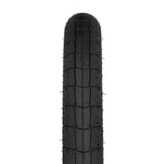 ÉCLAT FIREBALL TIRE with grind-friendly tread, Pangolin sidewall, and Cobweb layer for enhanced durability and traction.
