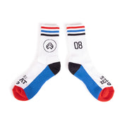 White ÉCLAT 08 SOCKS with red toes, blue and black accents, striped cuffs, and distinctive logo design.