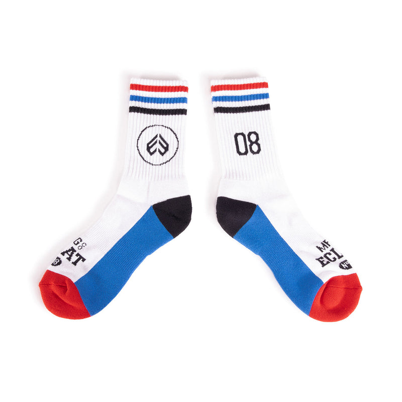 White ÉCLAT 08 SOCKS with red toes, blue and black accents, striped cuffs, and distinctive logo design.
