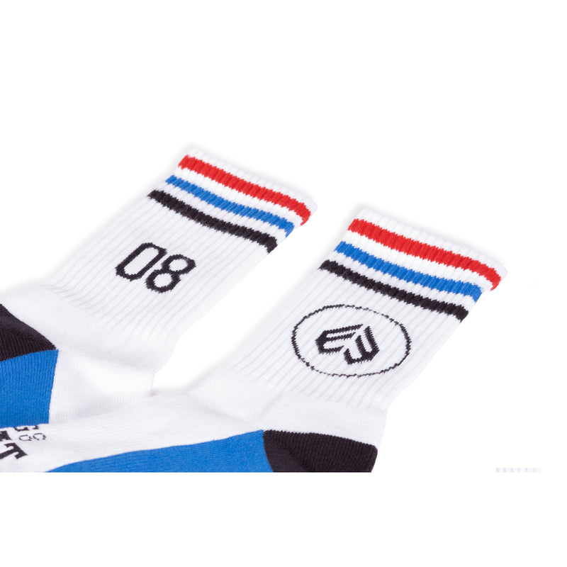 ÉCLAT 08 white cotton socks with colorful striped cuffs and stylish design.