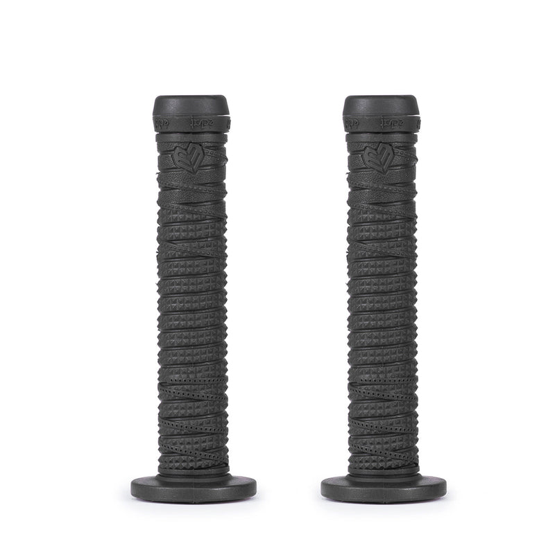 Pair of black ÉCLAT Sean Burns Grip bicycle handlebar grips with textured studded belt-inspired design and thick solid flanges.