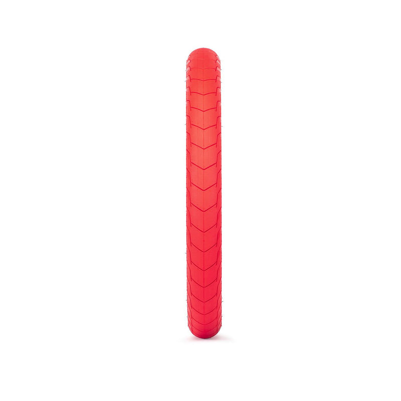 Red ÉCLAT Decoder BMX tire with fine knurling tread pattern for street and ramp use, 60tpi durable construction.