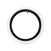 ÉCLAT DECODER TIRE white BMX street tire with black rim and low profile knurled tread pattern.