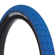 Blue ÉCLAT Fireball Tire with grind-resistant tread and reinforced sidewall.