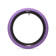 ÉCLAT FIREBALL TIRE in purple with grind-resistant sidewall and micro knurling for traction, ideal for street riding.