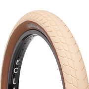 ÉCLAT MORROW TIRE with tan sidewall, fast-rolling tread, and high-performance puncture protection.