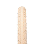 ÉCLAT MORROW TIRE with grippy tread in tan/gum sidewall.