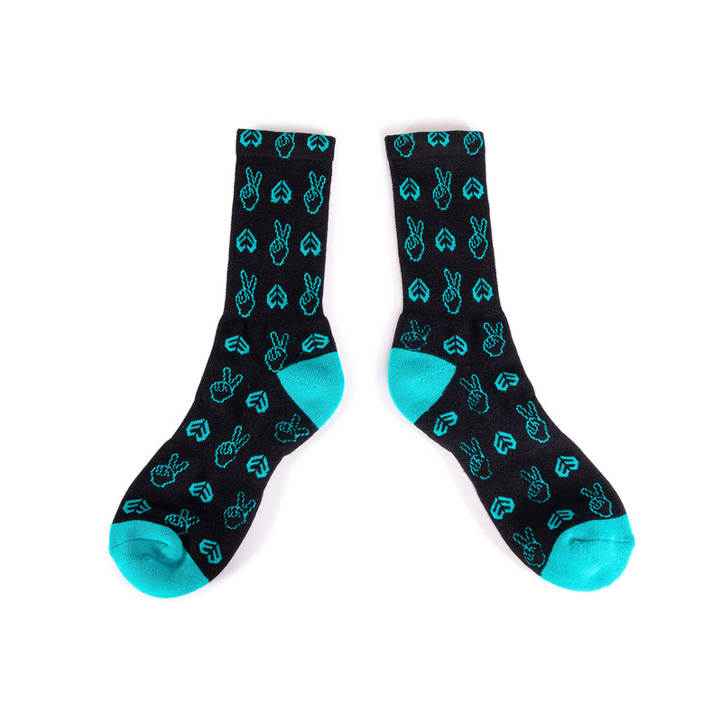 Black and turquoise ÉCLAT PEACE SOCKS with peace sign and eclat design pattern, made of cotton blend.