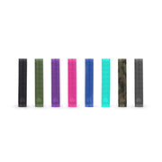 Colorful ÉCLAT SHOGUN GRIP bicycle handlebar grips in various shades including black, army green, purple, hot pink, classic blue, teal, camouflage, and grey with ribbed texture and flangeless design.