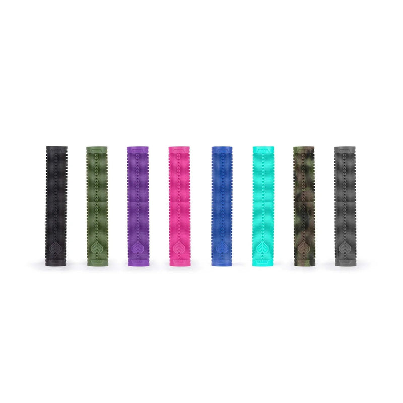 Colorful ÉCLAT SHOGUN GRIP bicycle handlebar grips in various shades including black, army green, purple, hot pink, classic blue, teal, camouflage, and grey with ribbed texture and flangeless design.
