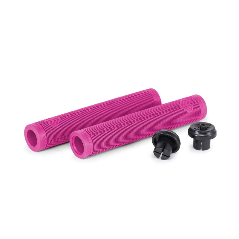 Pair of hot pink ÉCLAT SHOGUN GRIP bicycle grips with flangeless design and included black Techbolt barends on white background