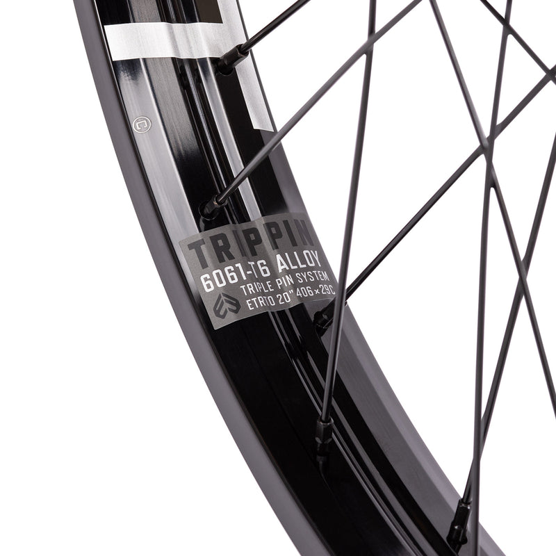 ÉCLAT TRIPPIN/CORTEX FRONT WHEEL with 6061-T6 alloy rim, hand-built with black spokes and hub guards.