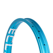 Wide blue ÉCLAT TRIPPIN RIM with durable 3mm pins and 38mm profile.