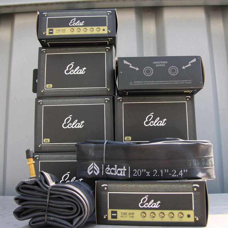 Éclat Tube Amp BMX inner tubes with steel valve, designed for 2.40"+ tires, shown with packaging.