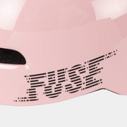 Glossy pink FUSE ALPHA helmet with high impact ABS shell and EPS foam.