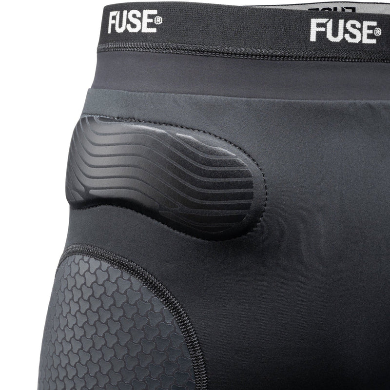 FUSE OMEGA Impact Shorts with SAS-TEC padding, breathable Lycra, and elastic waistband in black.