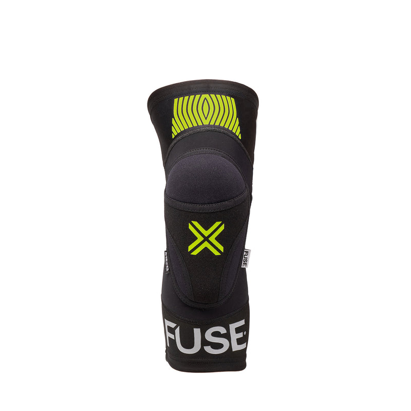 FUSE OMEGA KNEE PAD in black/yellow, featuring lightweight breathable Lycra, SAS-TEC foam insert for impact protection, and strapless design.