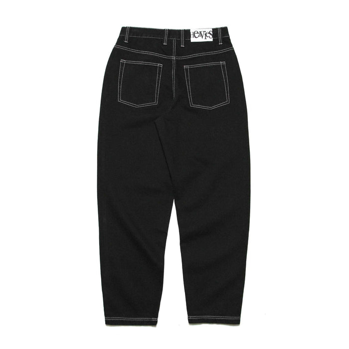HEAVIES CLASSIC BLACK JEANS with baggy fit, high waist, five pockets, and tapered legs.