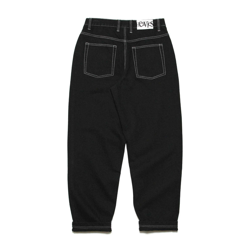 HEAVIES Classic Black Jeans with baggy fit and tapered leg opening.
