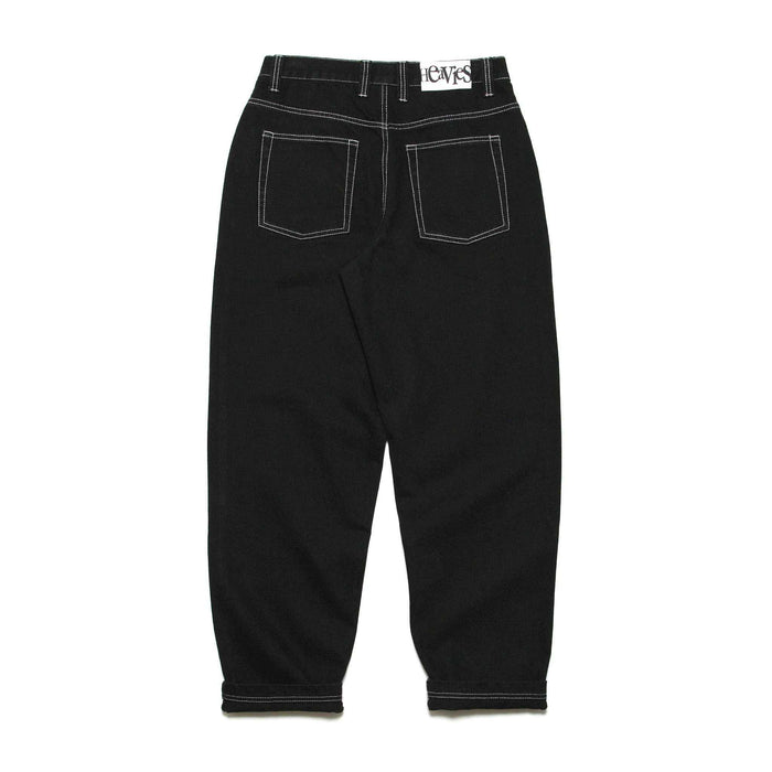 HEAVIES Classic Black Jeans with baggy fit and tapered leg opening.
