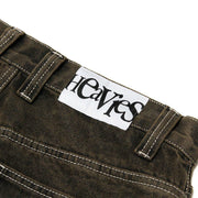 HEAVIES Classic Brown Washed Jeans with label and stitching details.