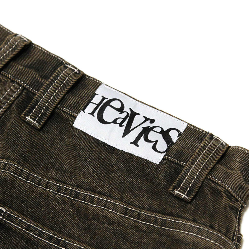 HEAVIES Classic Brown Washed Jeans with label and stitching details.