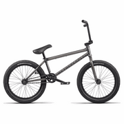 Wethepeople Justice complete BMX bike with black frame, 20.75" top tube, Activate tires, and Paragon Plastic Guard Sprocket.