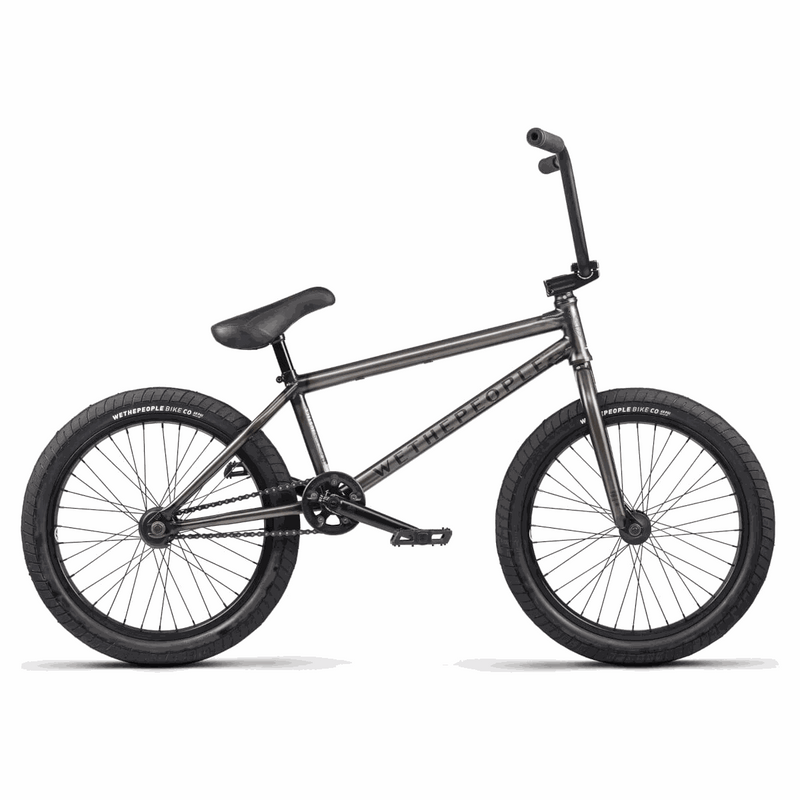 Wethepeople Justice complete BMX bike with black frame, 20.75" top tube, Activate tires, and Paragon Plastic Guard Sprocket.