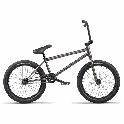 Wethepeople Justice complete BMX bike with black frame, 20.75" top tube, Activate tires, and Paragon Plastic Guard Sprocket.