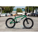 Green Sunday Forecaster 20-inch BMX bike with tan seat and black wheels on city street background