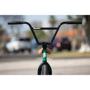Front view of Sunday Forecaster BMX bike with black handlebars and green frame detailing
