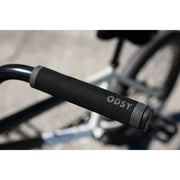 Close-up of black Odyssey branded handlebar grip on Sunday Forecaster BMX bike in matte black to grey fade finish