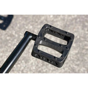 Close-up of black Odyssey Twisted Pro pedal attached to chromoly crank arm on Sunday Forecaster BMX bike